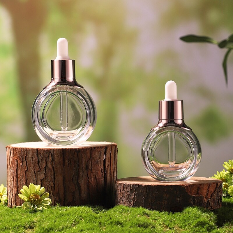 round clear dropper glass bottle with sliver lid