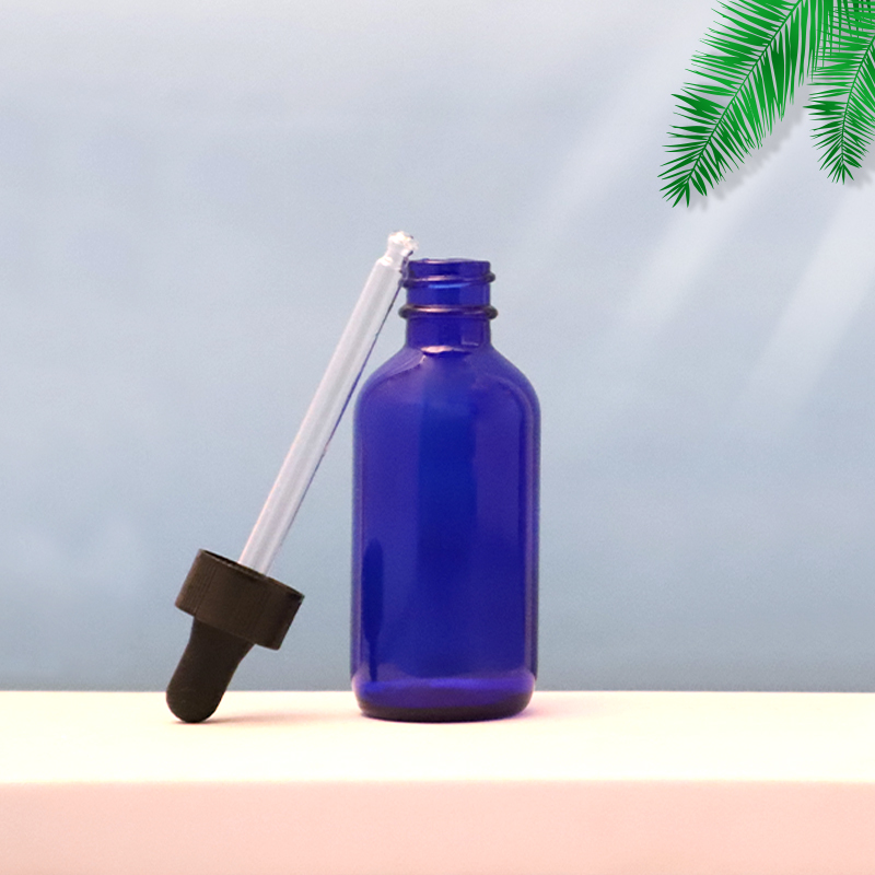 blue serum packaging with dropper lid